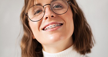 closeup of woman smiling with braces