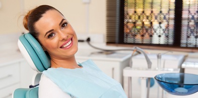 Smiling woman in the dental chair