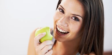 Woman enjoying an apple
